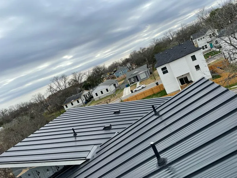 Standing seam metal roof panels with vents for Skylight Repair in Champlin